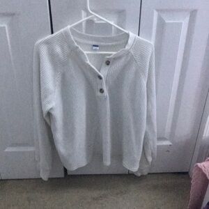 Large white long sleeve waffle knit tee.